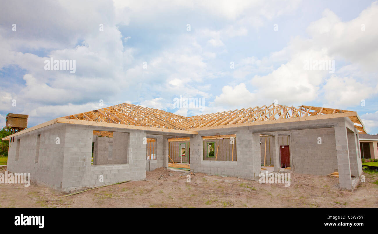Cement block walls, wood roof truss home construction Stock Photo
