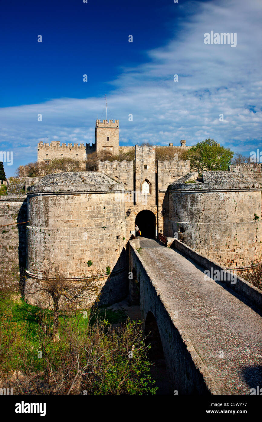 The palace of the Grand Master, behind the gate d' Amboise and the ditch of the Medieval town of Rhodes island, Greece Stock Photo