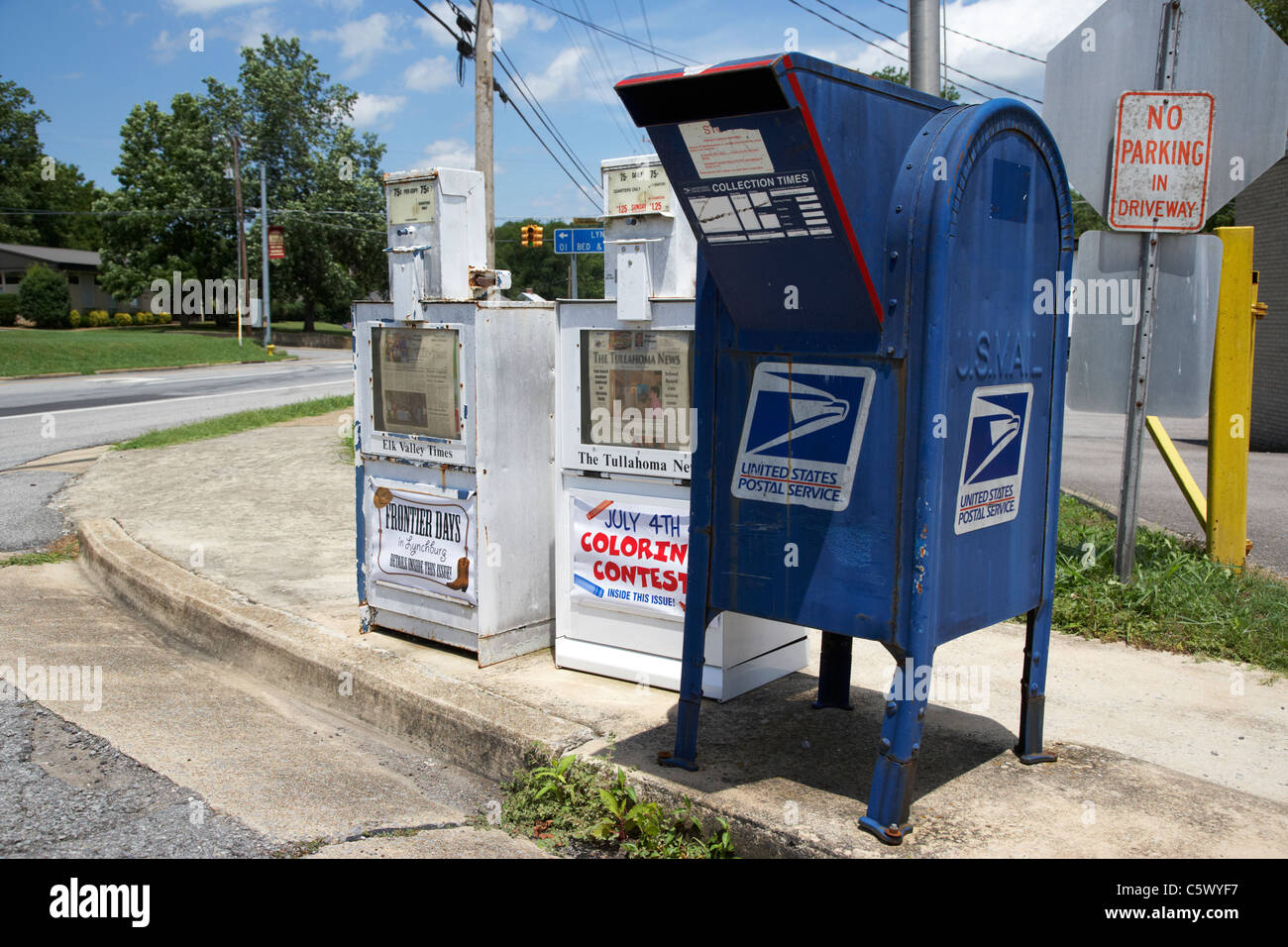 american usps united states postal service mailbox and newspaper boxes in Lynchburg , tennessee , usa Stock Photo