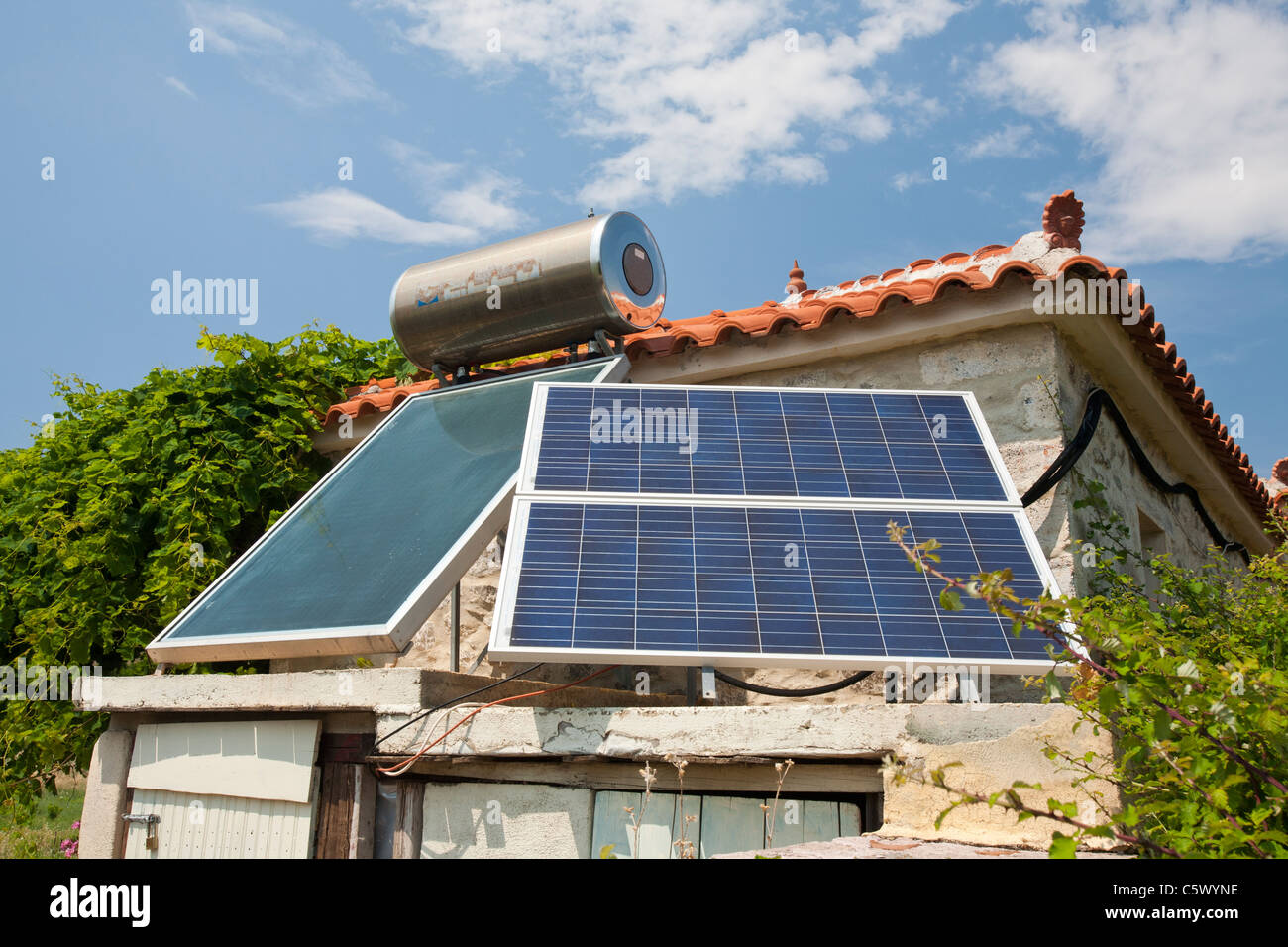 A house with solar water and electric at Skala Eresou on Lesbos, Greece. Stock Photo