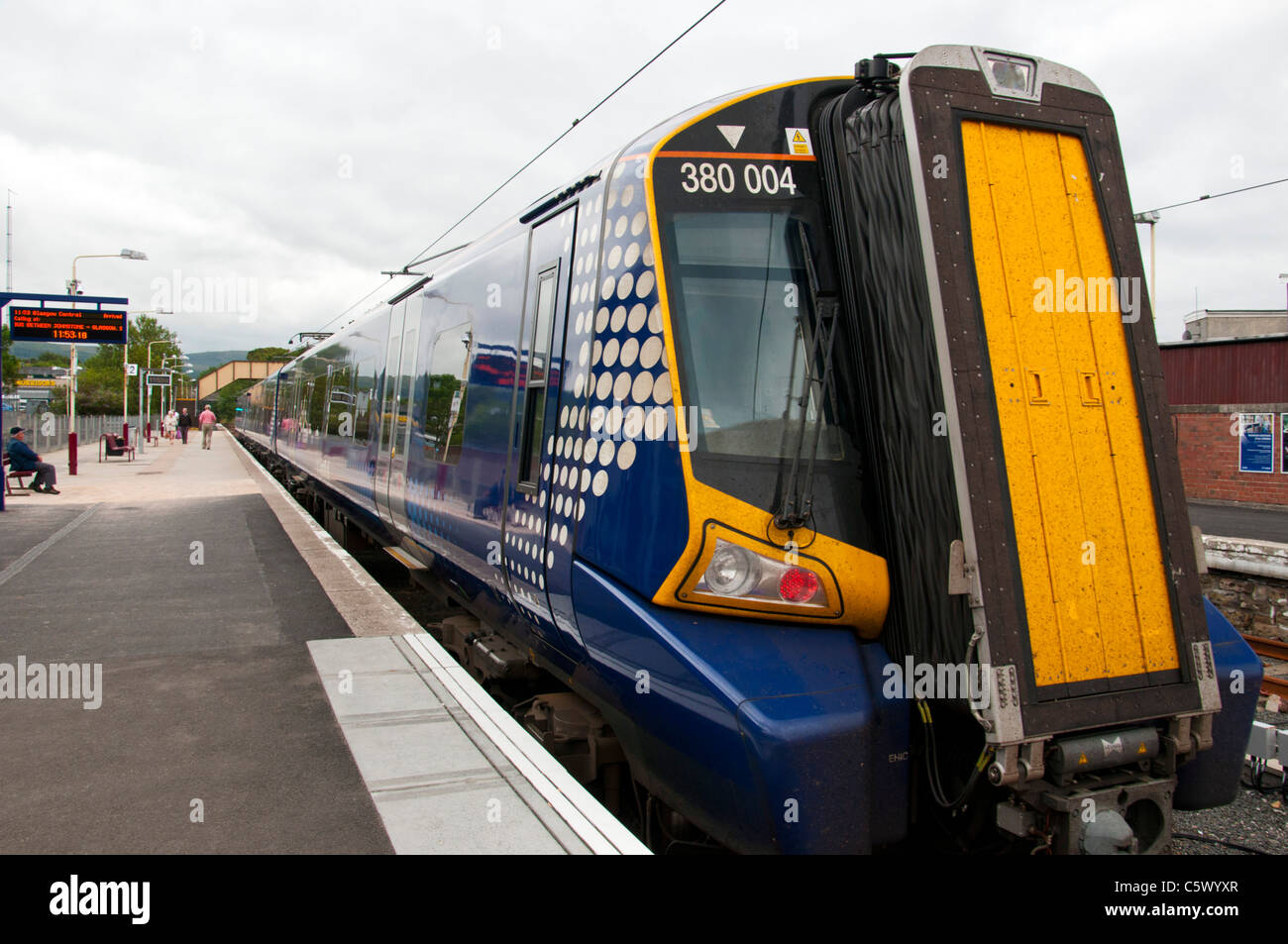 A Class 380 electric train sits at Largs station waiting to depart for Glasgow Stock Photo Alamy