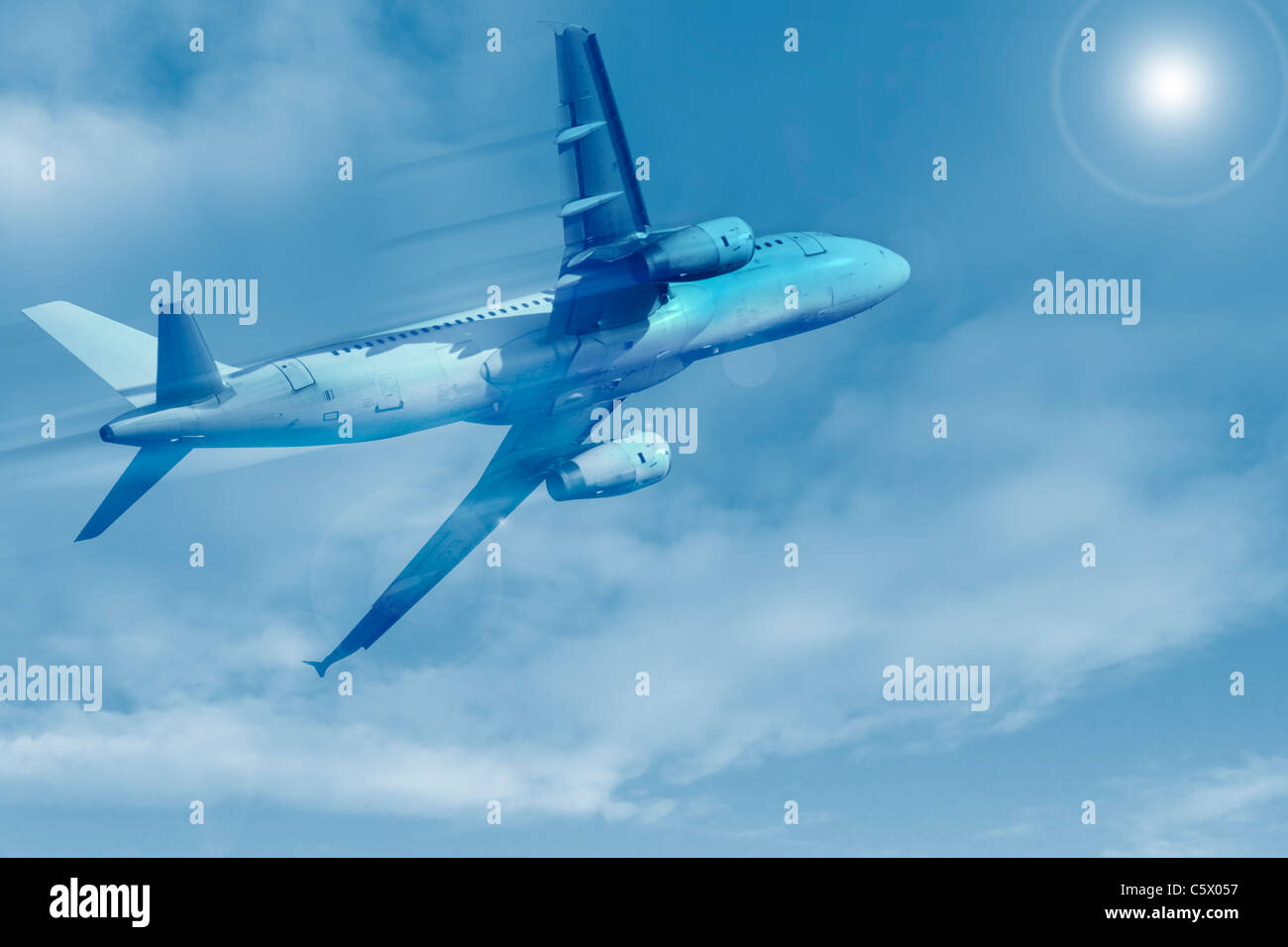 Passenger plane flying in the sky background Stock Photo - Alamy