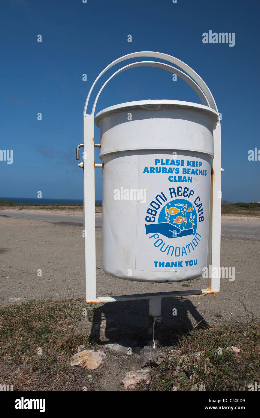 Eboni Reef Care Foundation advertisement on litter bin by the California Lighthouse on Arashi Beach, Aruba, Dutch Caribbean Stock Photo