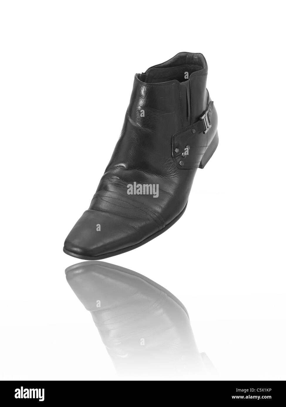 Modern boots isolated against a white background Stock Photo - Alamy