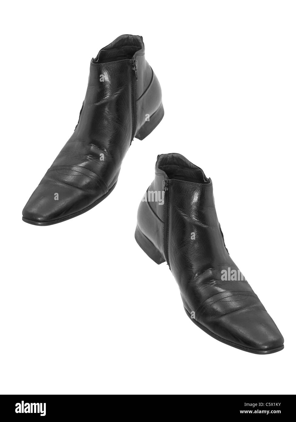 Modern boots isolated against a white background Stock Photo - Alamy