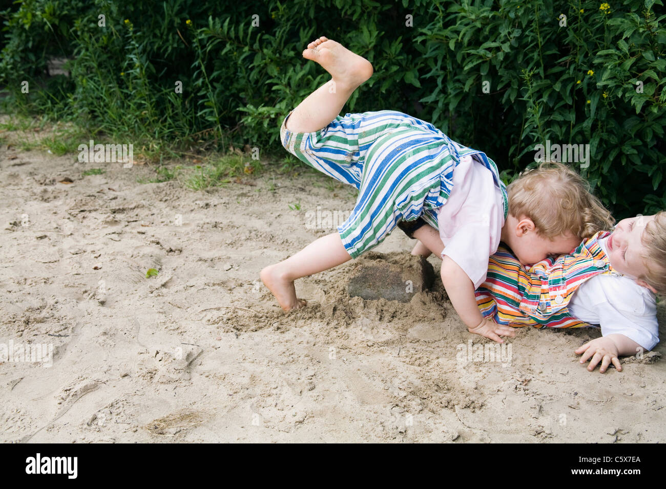 Germany, Berlin, Two boys (2-3) (3-4) playing together in sandbox Stock Photo - Alamy Germany, Berlin, Two boys (2-3) (3-4) playing together in sandbox Stock Photo - Alamy