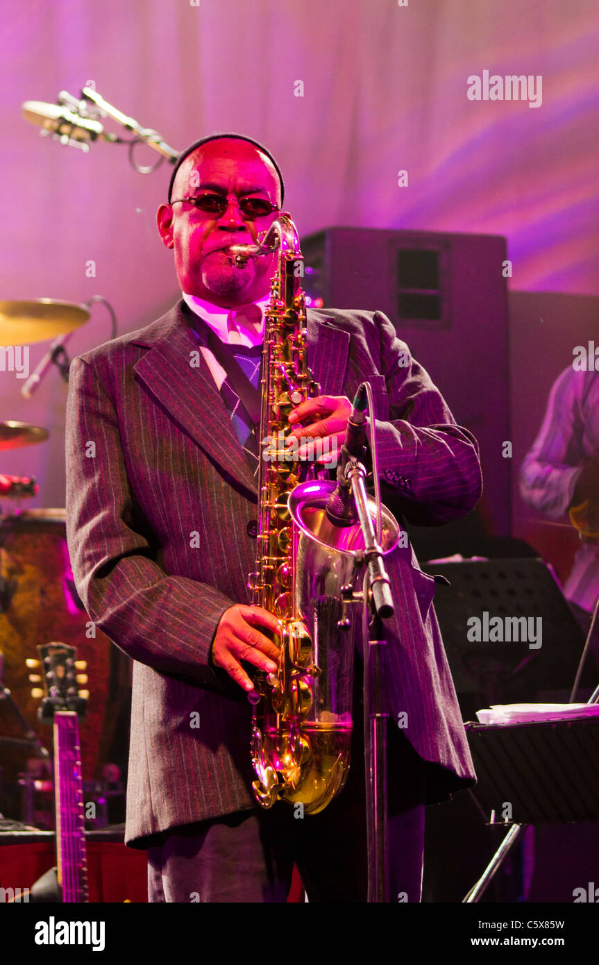 Jools Holland Rhythm and Blues Orchestra member, Michael Bammi Rose, Tenor Sax, performs at the