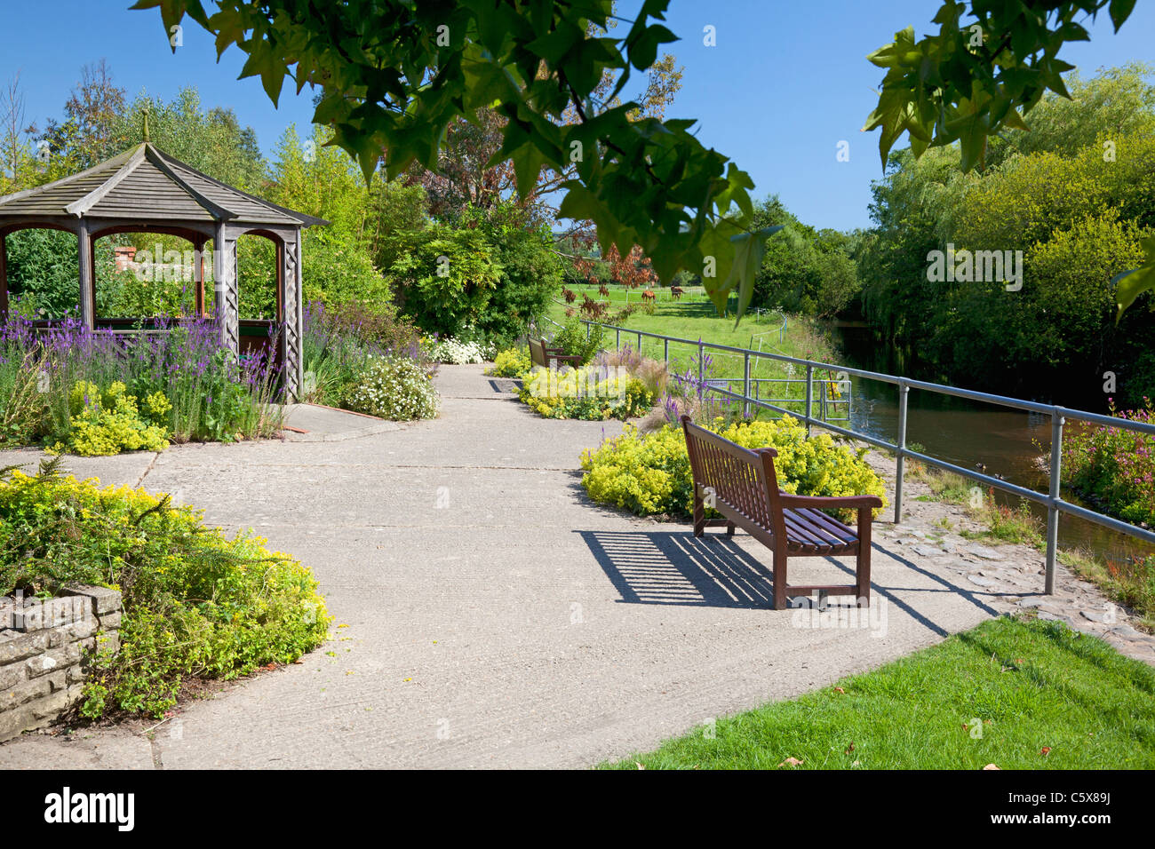 Gazebo in public garden beside the River Coly, Colyton, Devon Stock