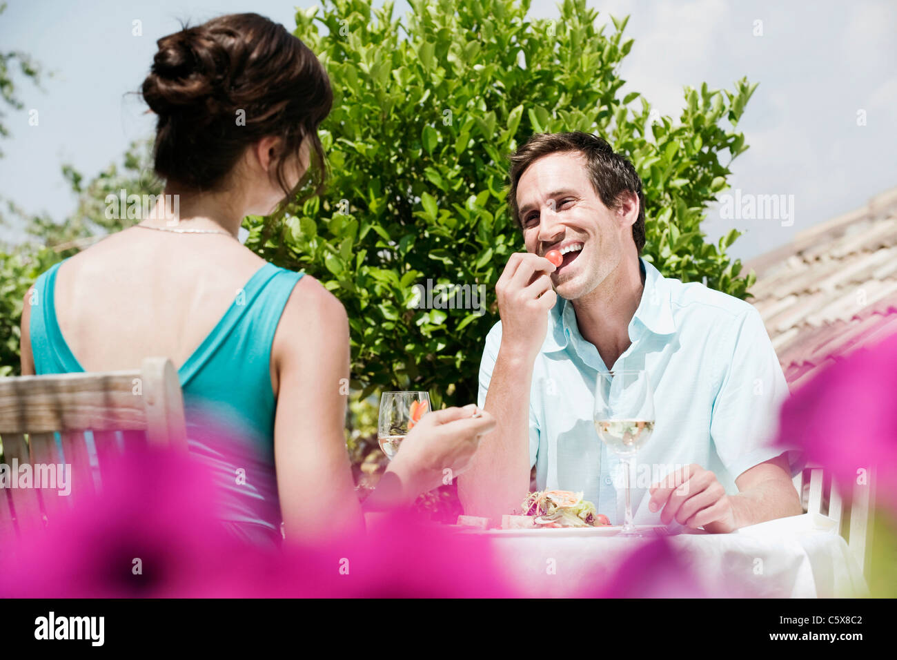 Italy, South Tyrol, Couple having lunch in restaurant Stock Photo