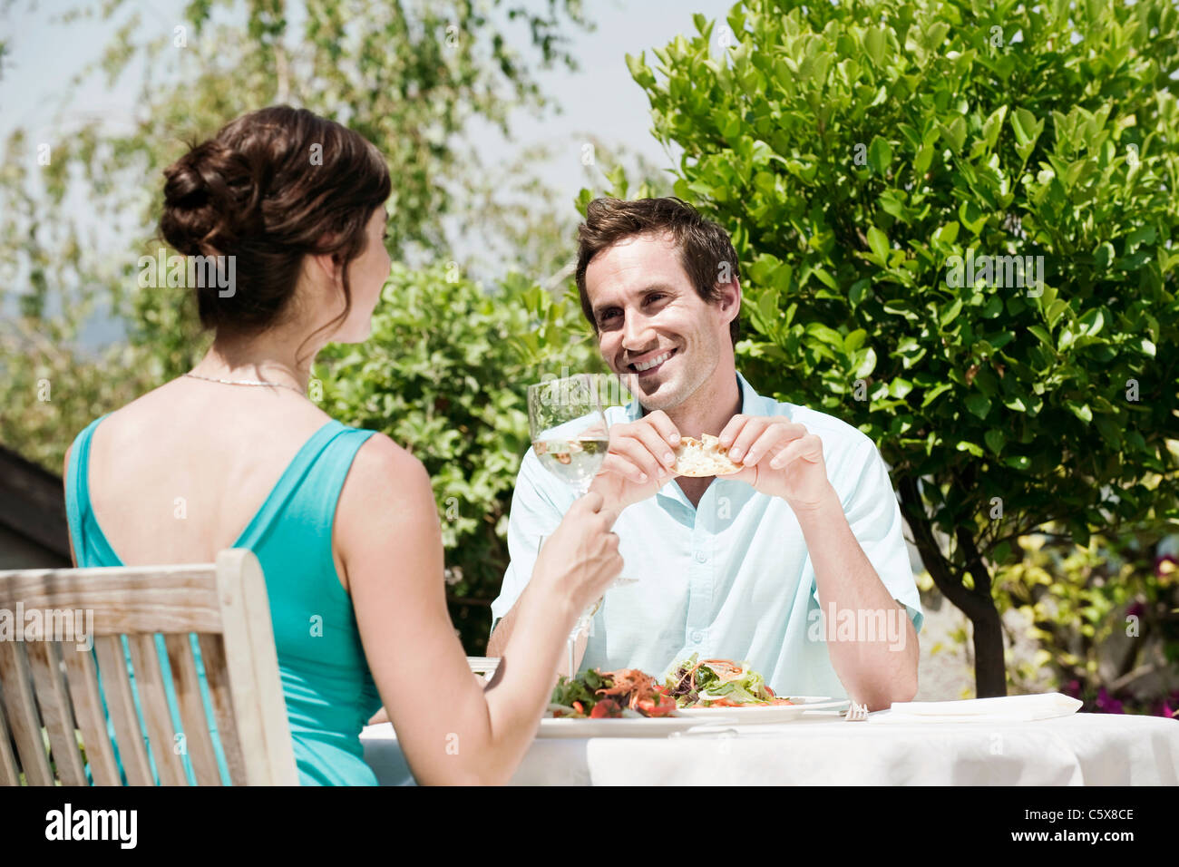Italy, South Tyrol, Couple in restaurant having lunch Stock Photo