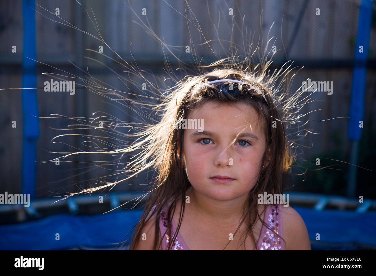 Little Girl Whose Hair Has Been Made To Stand Up On End By Static
