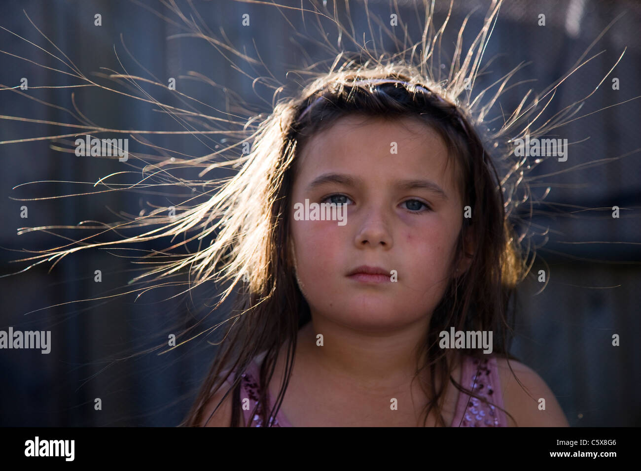 Little Girl Whose Hair Has Been Made To Stand Up On End By Static