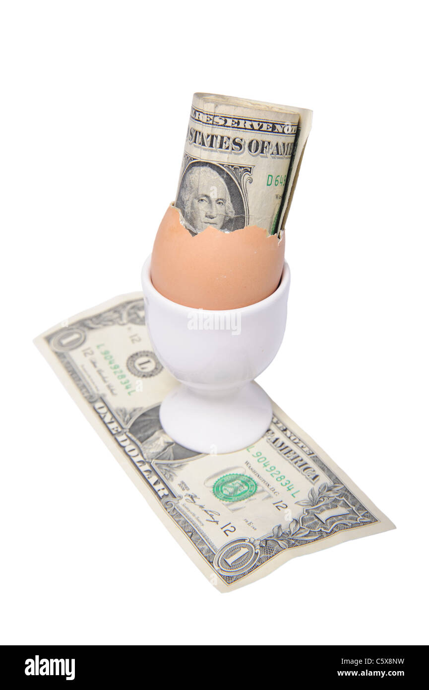 Picture of a American Dollar and a roll of dollars in an egg and eggcup