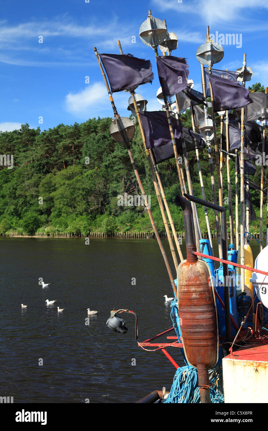 Fishing nets flags in Mrzeżyno Harbour, Rega River, Baltic Sea, Pomerania, Poland Stock Photo