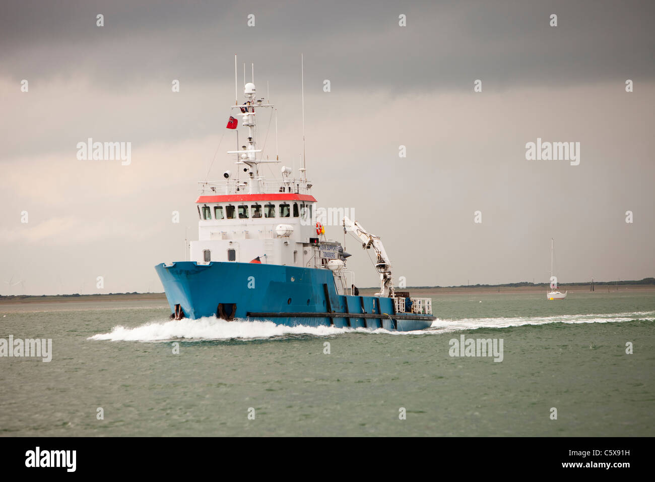 A vessel in the Walney Channel off Barrow in Furness, Cumbria, UK. Stock Photo