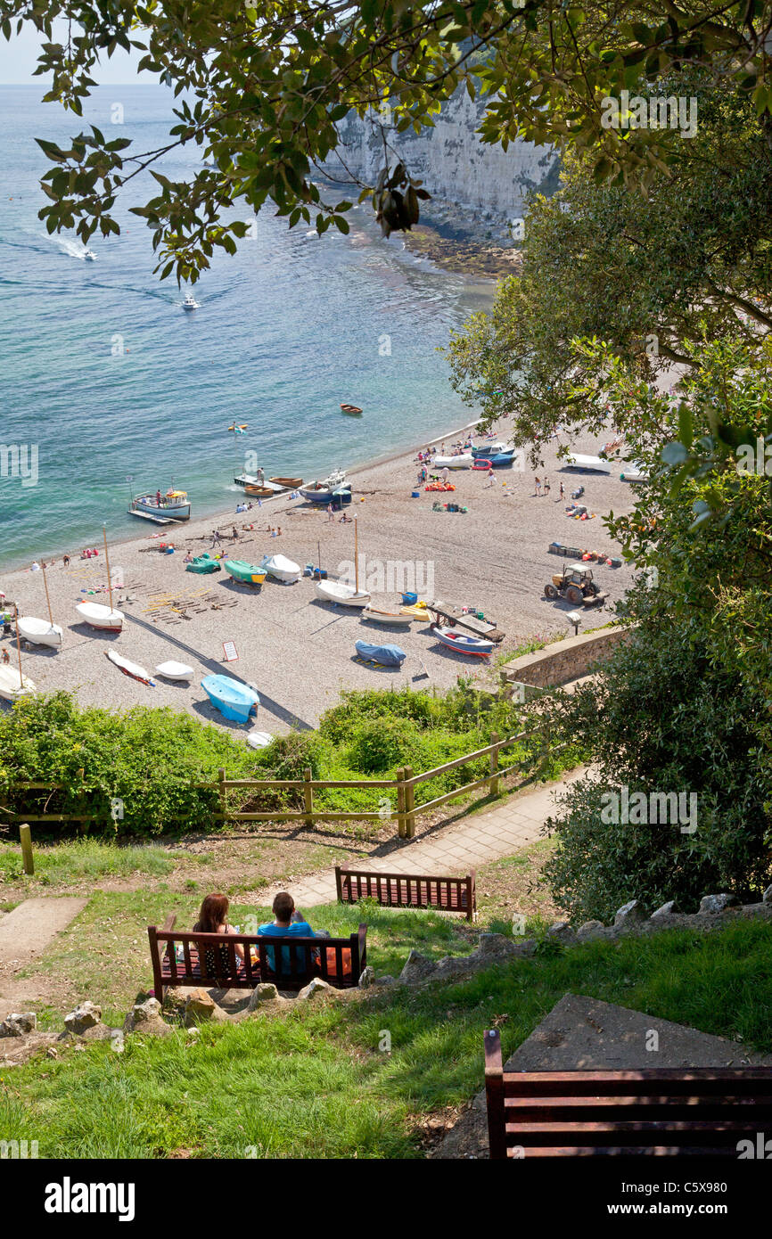 Couple Enjoying The View Of The Beach From Jubilee Gardens Beer Devon couple-enjoying-the-view-of-the-beach-from-jubilee-gardens-beer-devon