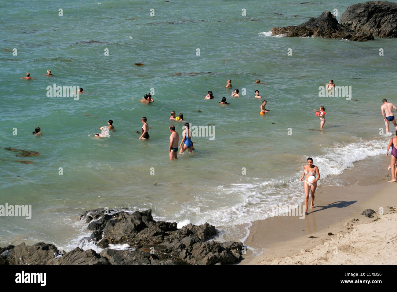 Swimming at the beach, Granville (Manche, Normandy, France Stock Photo
