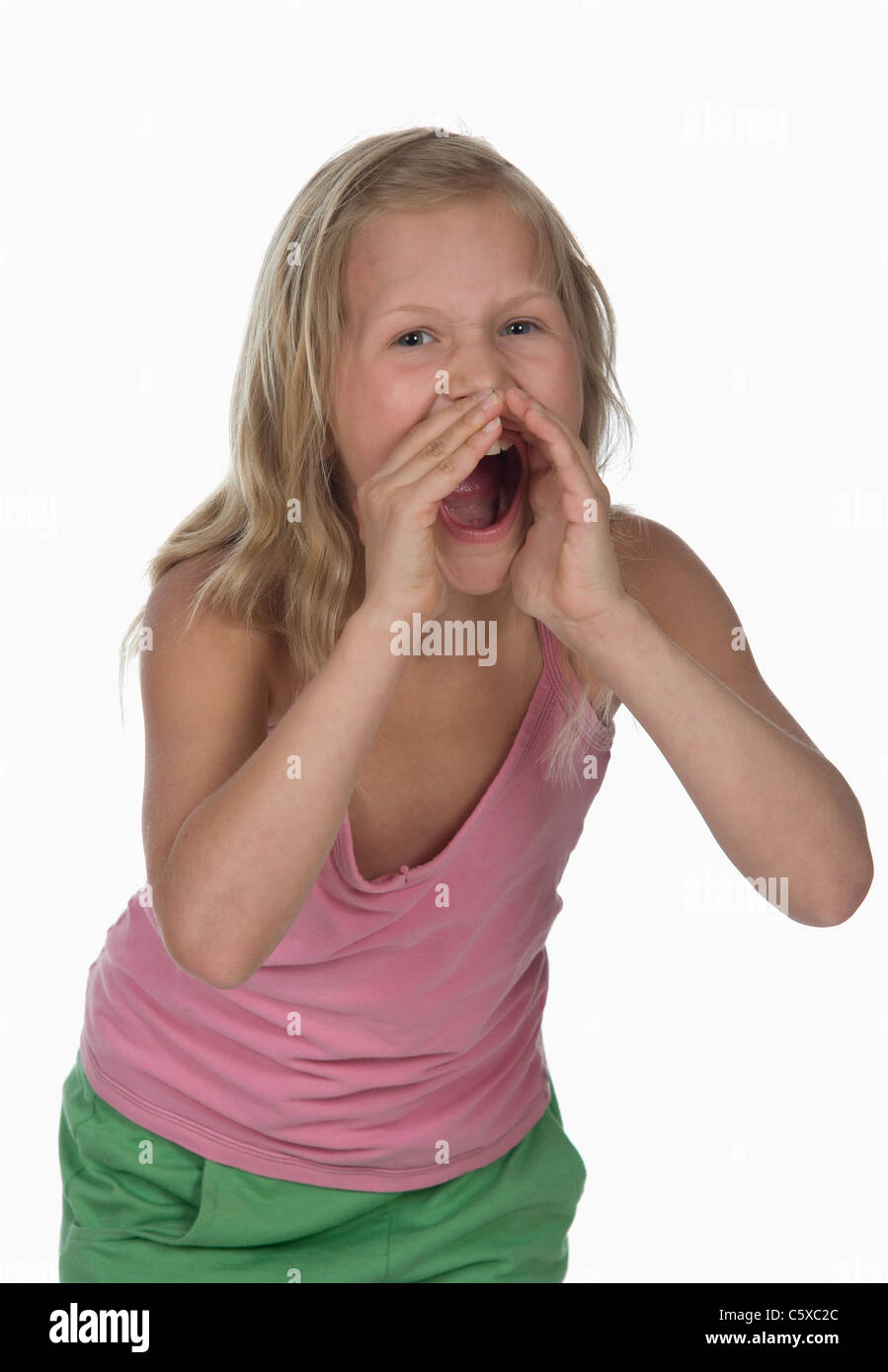 Portrait of a girl (10-11) shouting Stock Photo