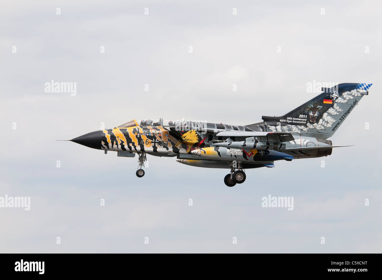 German Panavia Tornado ECR 46+33 painted in Nato Tiger Livery arrives at RAF Fairford for the 2011 Air Tattoo Stock Photo