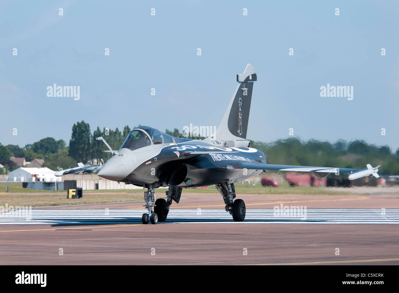 French Air Force Dassault Rafale C 113-IW demonstration aircraft taxis to its stand at RAF Fairford ready to display at the RIAT Stock Photo
