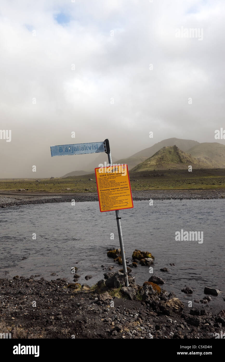 Warning Sign at the Crossing Point Blafjallakvisl River on the Laugavegur (Laugavegurinn) Hiking Trail, Iceland Stock Photo