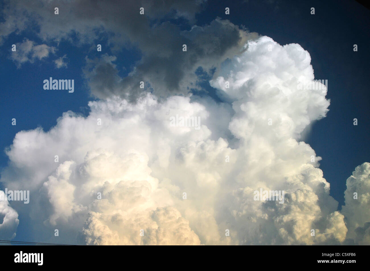 A Pileus Cloud formation in the sky. Stock Photo