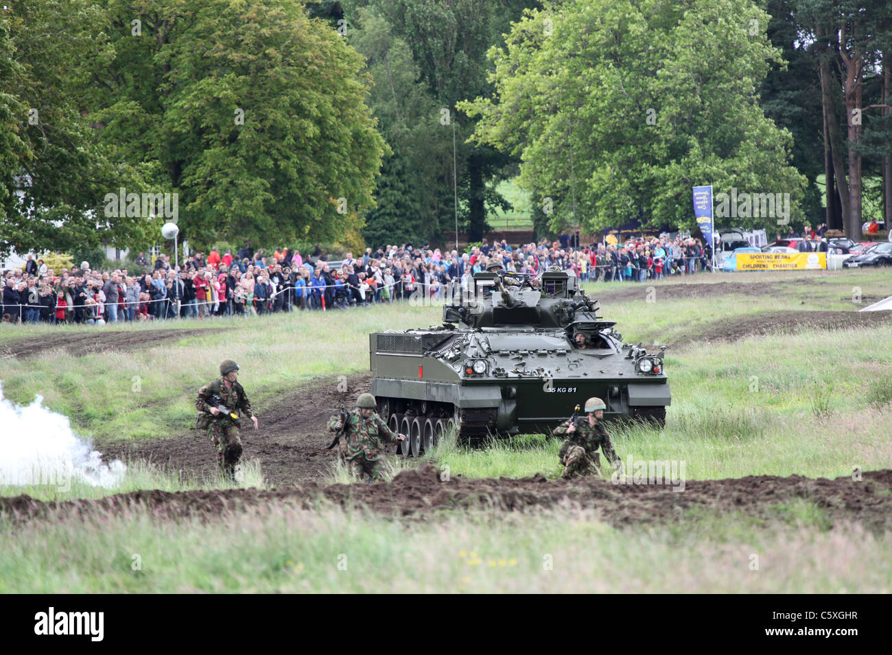 Cholmondeley Castle Pageant of Power. A Warrior Infantry Fighting Vehicle during a military assault demonstration. Stock Photo