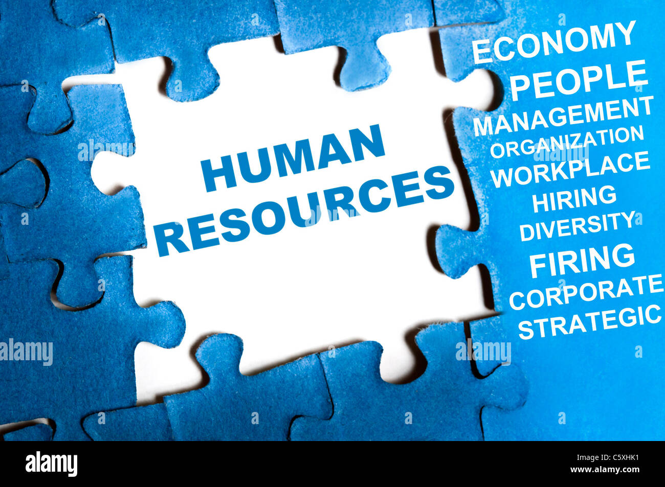 Human resource blue puzzle pieces assembled Stock Photo