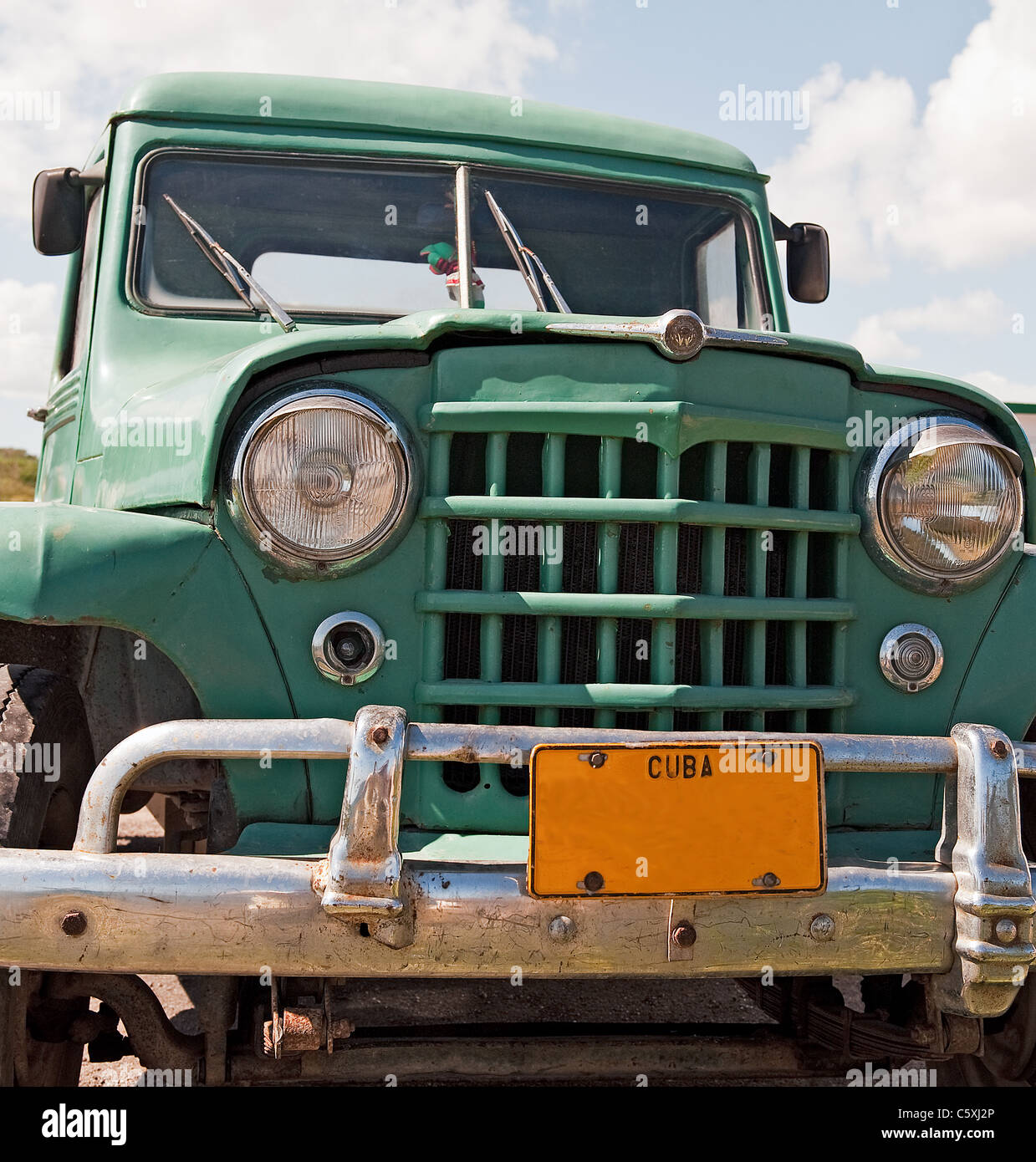 Classic green truck front view with cuba licence plate Stock Photo