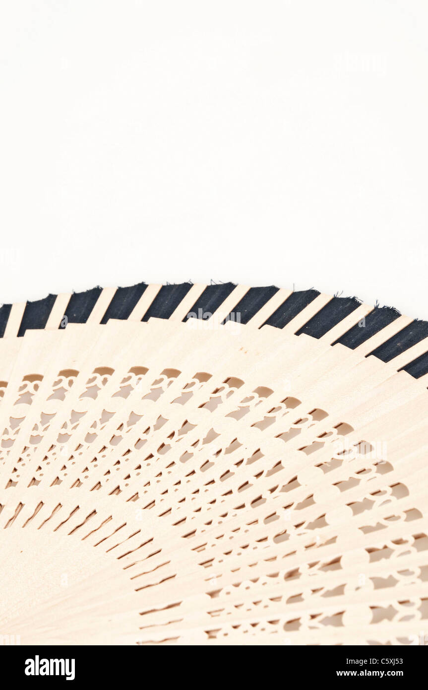 Isolated wooden fan on white background Stock Photo