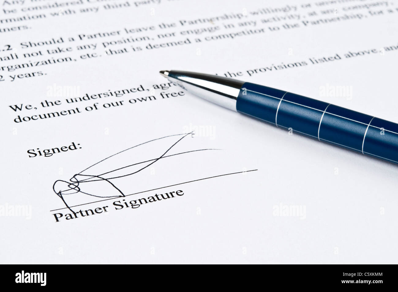 Close-up to contract on signature Stock Photo