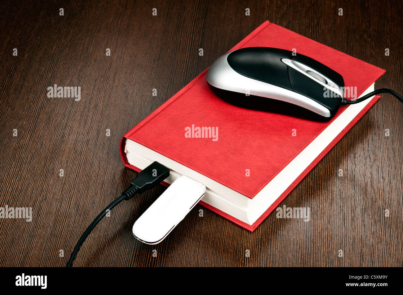Electronic book concept on desk Stock Photo Alamy
