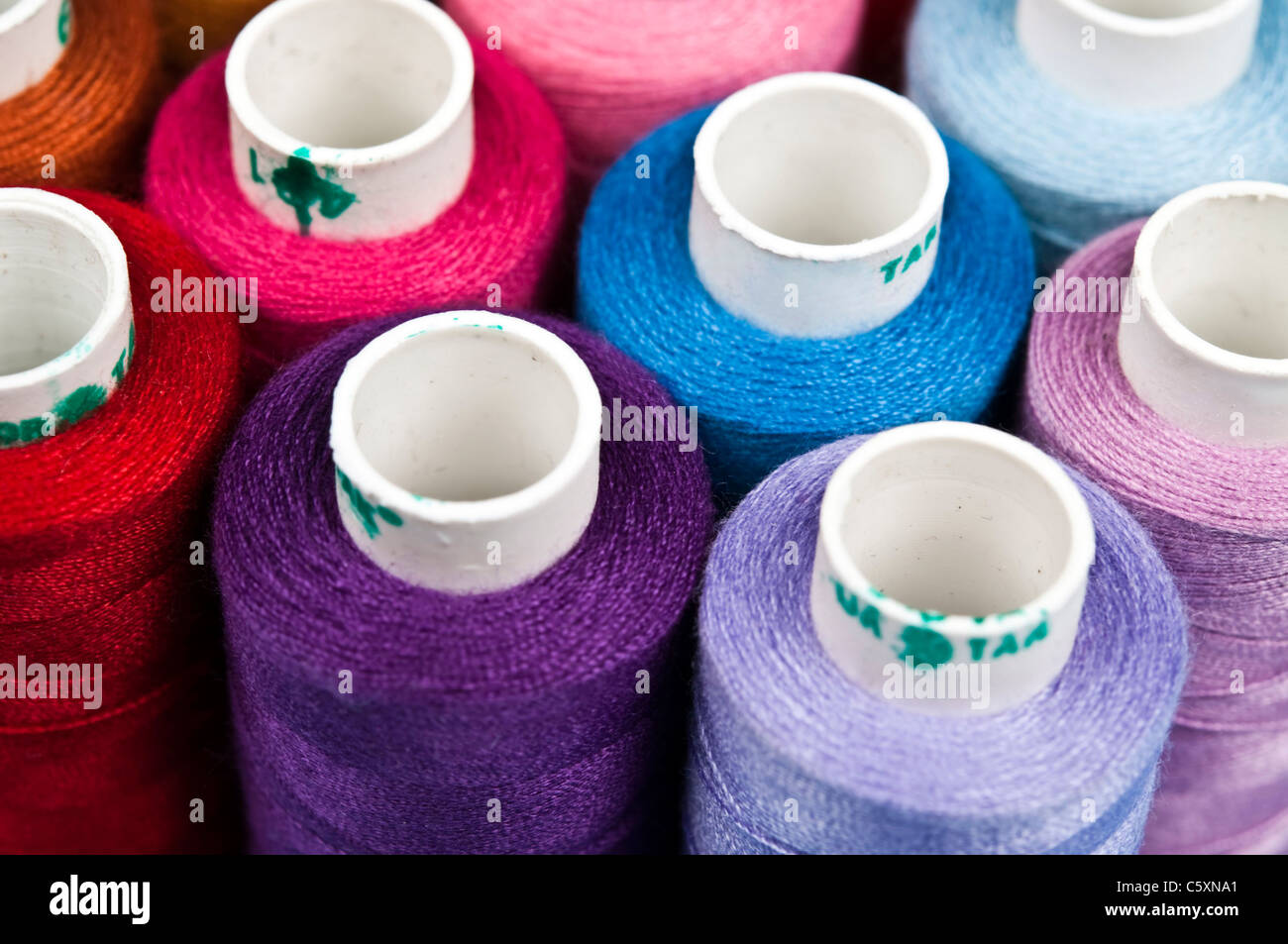 Colorful thread group close up Stock Photo - Alamy