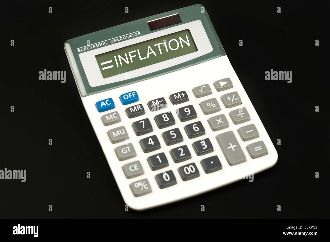 Inflation word on electronic calculator Stock Photo