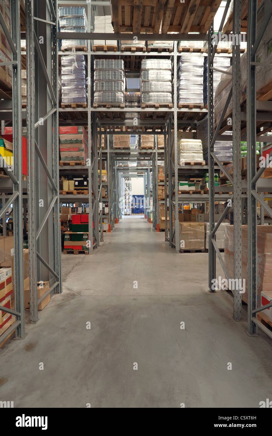 Warehouse interior, classified beverages packs on the shelves Stock Photo Alamy