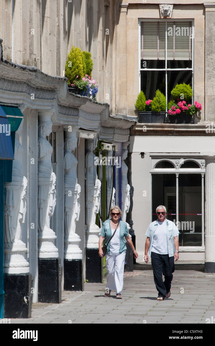 The white female sculptures around the buildings at Montpellier Walk in the Spa town of Cheltenham. Stock Photo