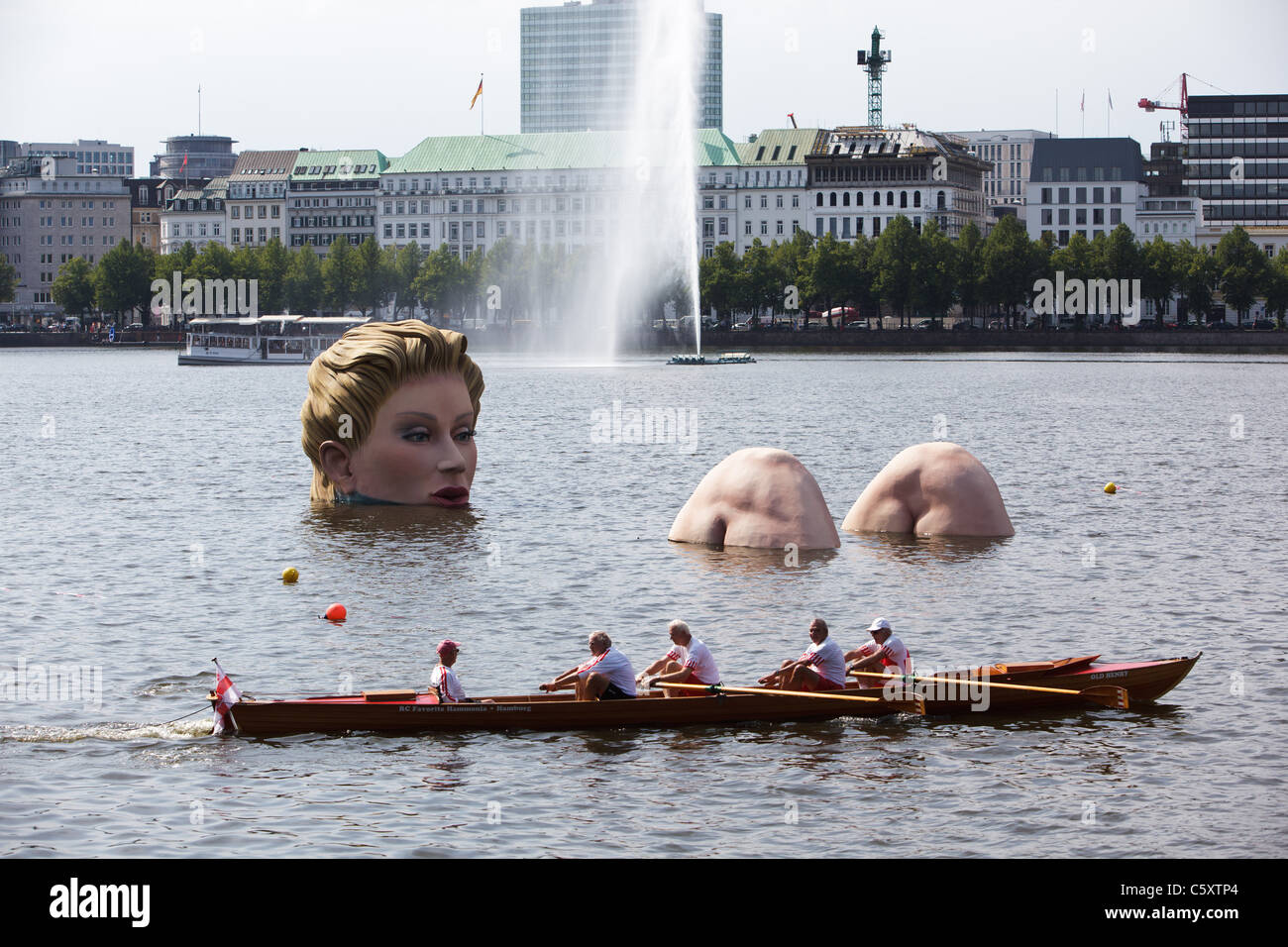 A 'mermaid' sculpture created by Oliver Voss is seen on Alster lake. Stock Photo