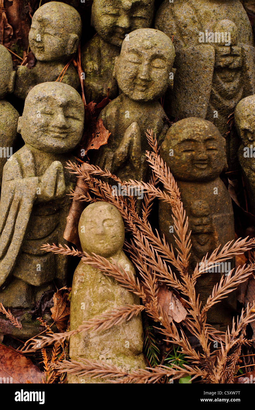 People bring jizo buddhist statues to the small shrine from all over Japan to pray for sick children. Stock Photo