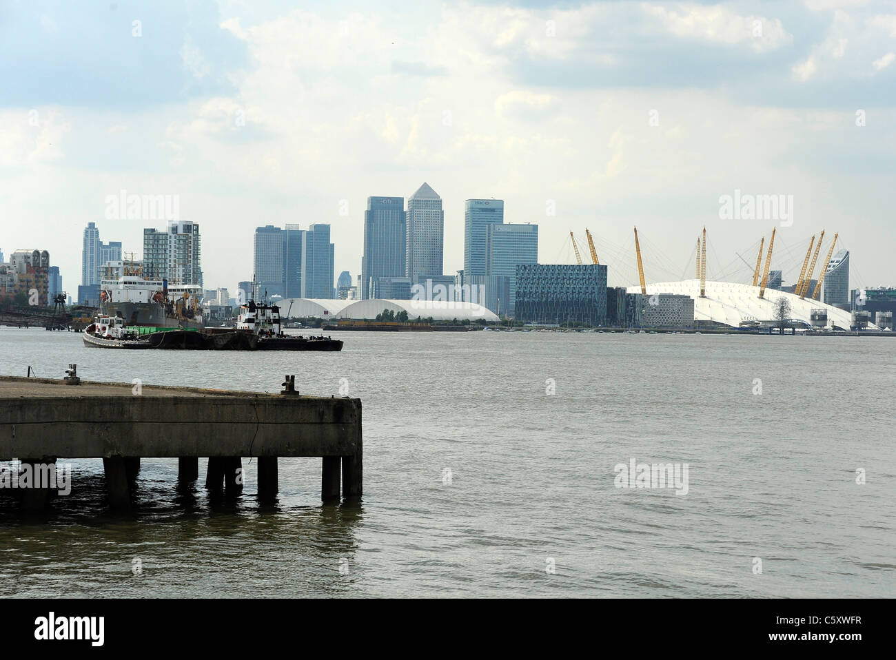 Distant view of Canary Wharf and the 02 Stock Photo