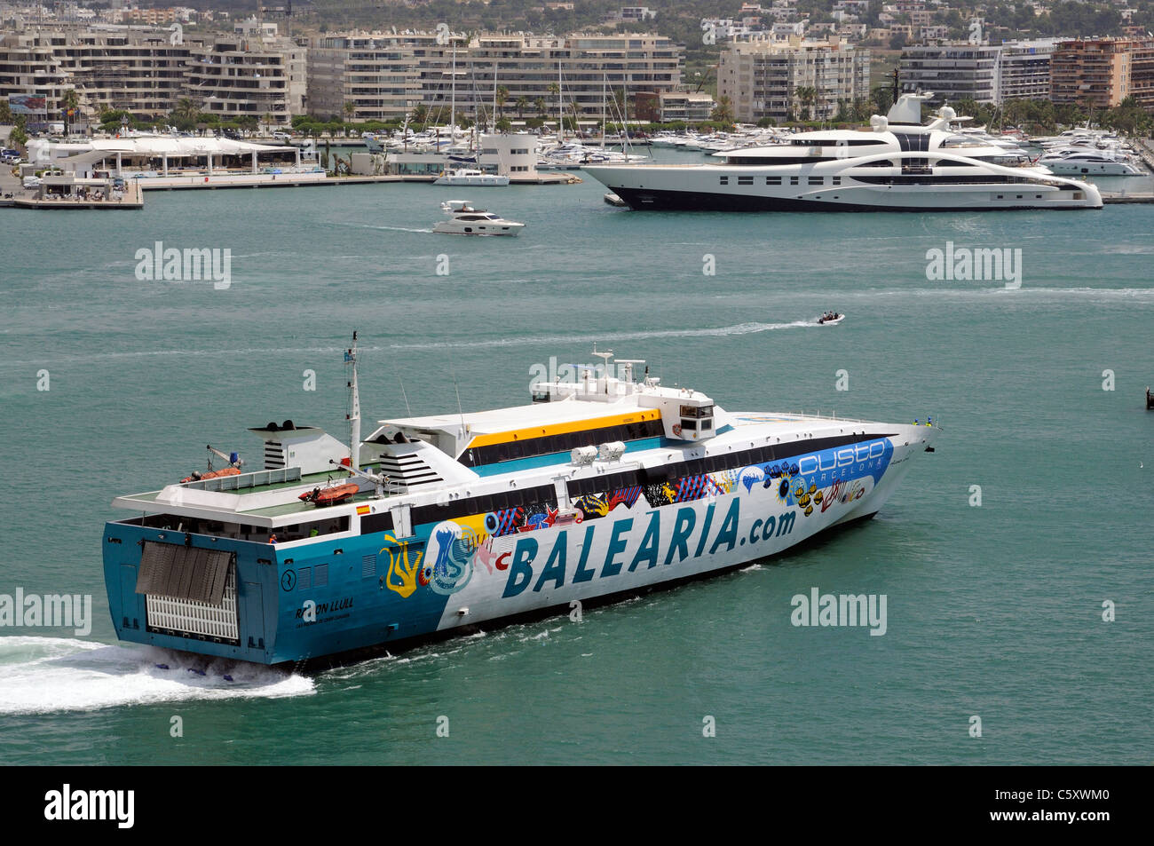 Roro fast ferry Ramon Llull of the Balearia company enters Eivissa port on the Spanish island of Ibiza Stock Photo
