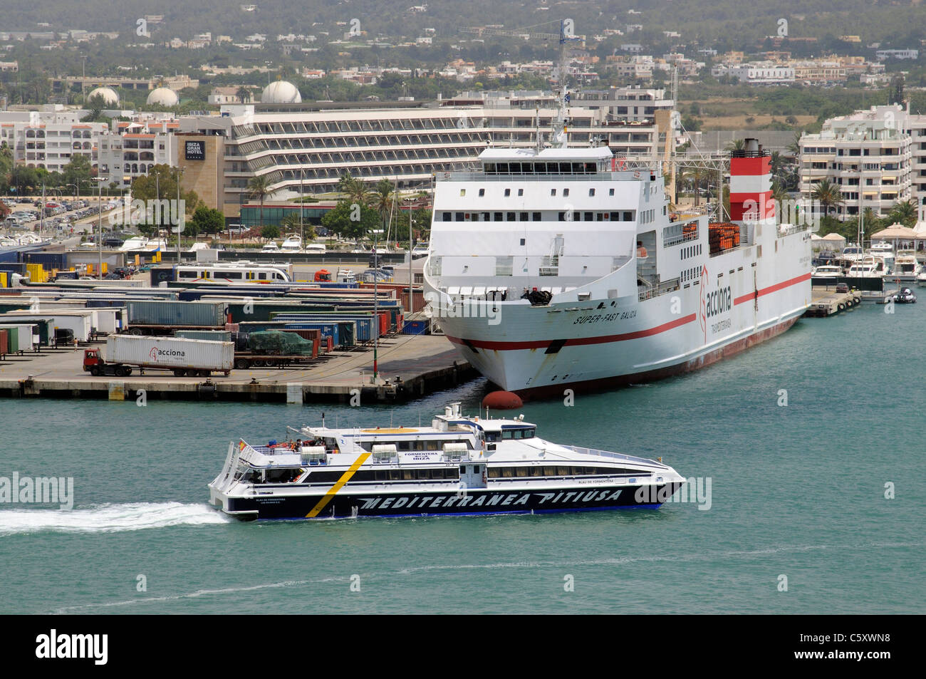 Eivissa port on the Spanish island of Ibiza a fast passenger ferry underway for Formentera island Stock Photo