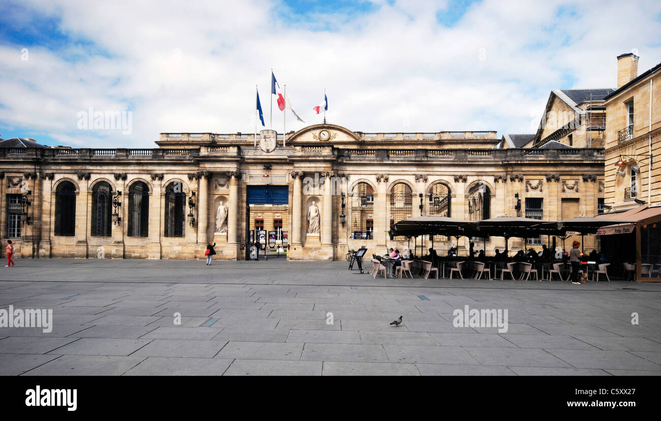 French flags on the City hall (Mairie de Bordeaux) in Bordeaux, France. Stock Photo