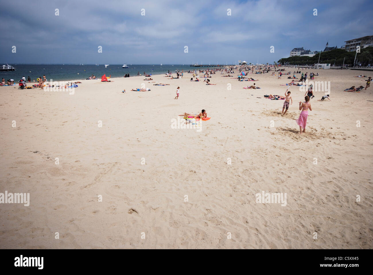 Beach life at the Arcachon Beach, Plage d’Arcachon, in south-western France. Stock Photo