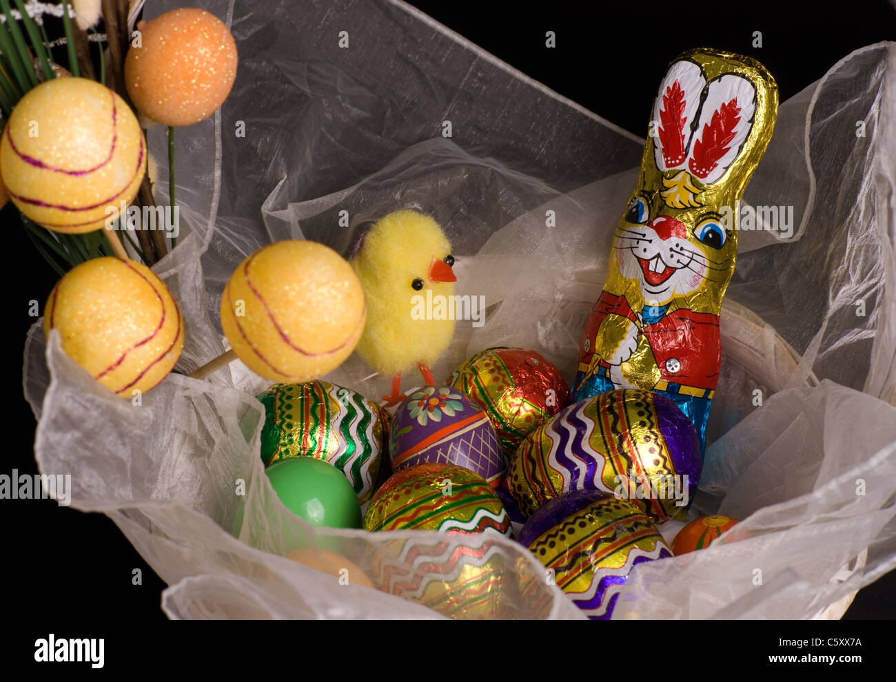 easter bunny and chicken with colored eggs Stock Photo
