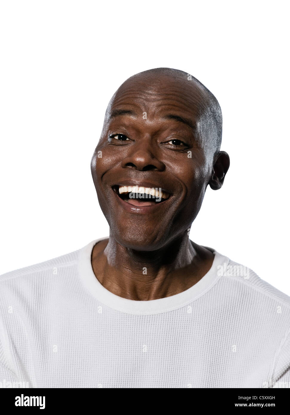 Close-up portrait of an afro American laughing man in studio on white isolated background Stock Photo