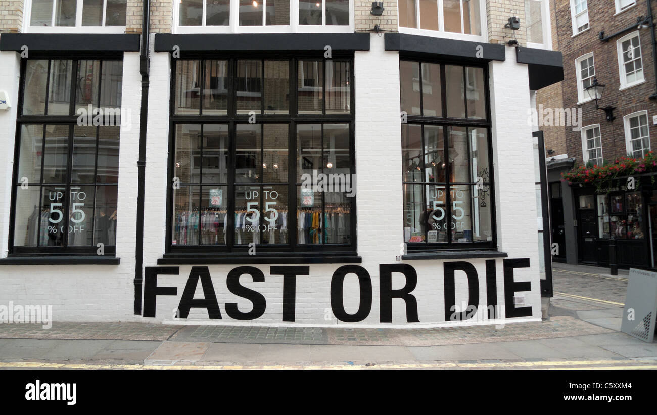 55DSL store on Newburgh Street displaying 'Fast or Die' sign, London England UK Stock Photo