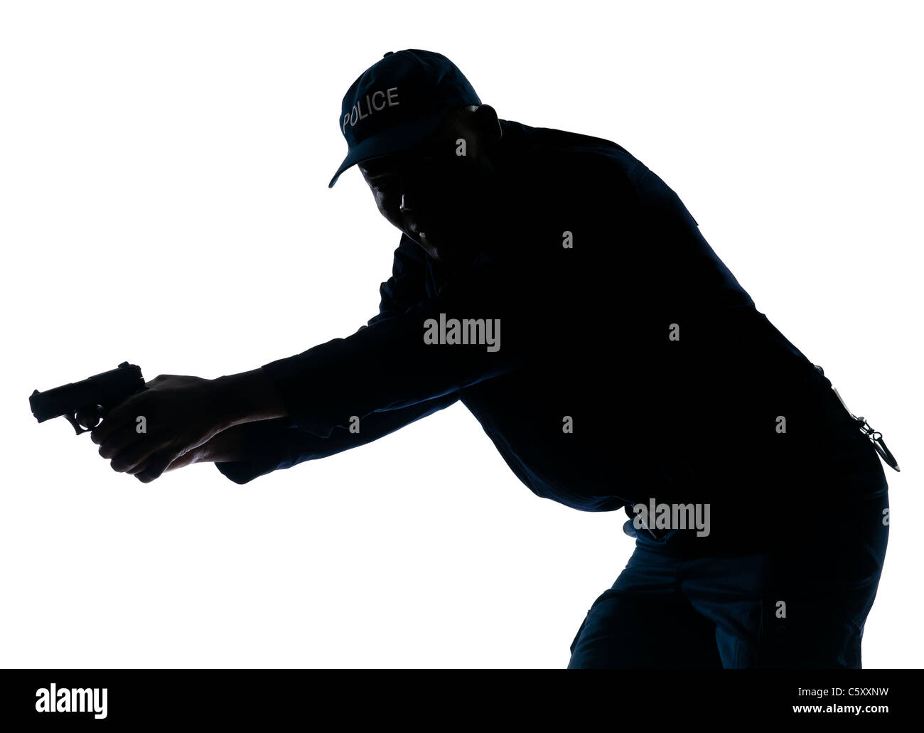 An afro American policeman holding handgun in studio on white isolated background Stock Photo