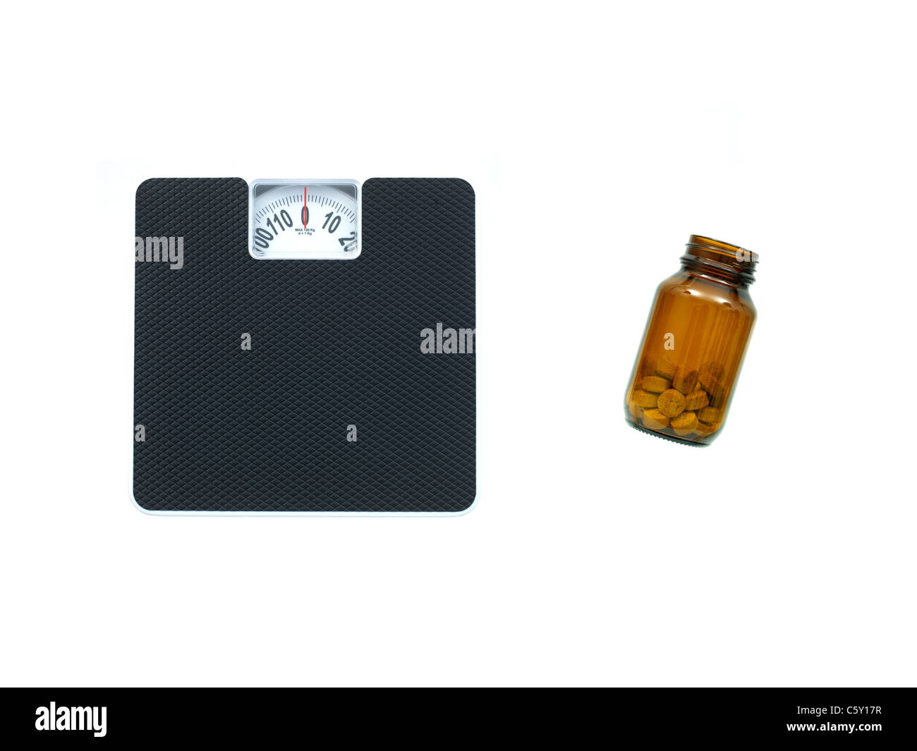 Bathroom scales isolated against a white background Stock Photo Alamy