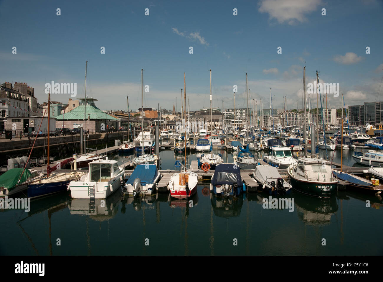 A view of the marina at the Barbican, Plymouth, Devon, taken in the summer with sailing boats of all shapes and sizes. Stock Photo