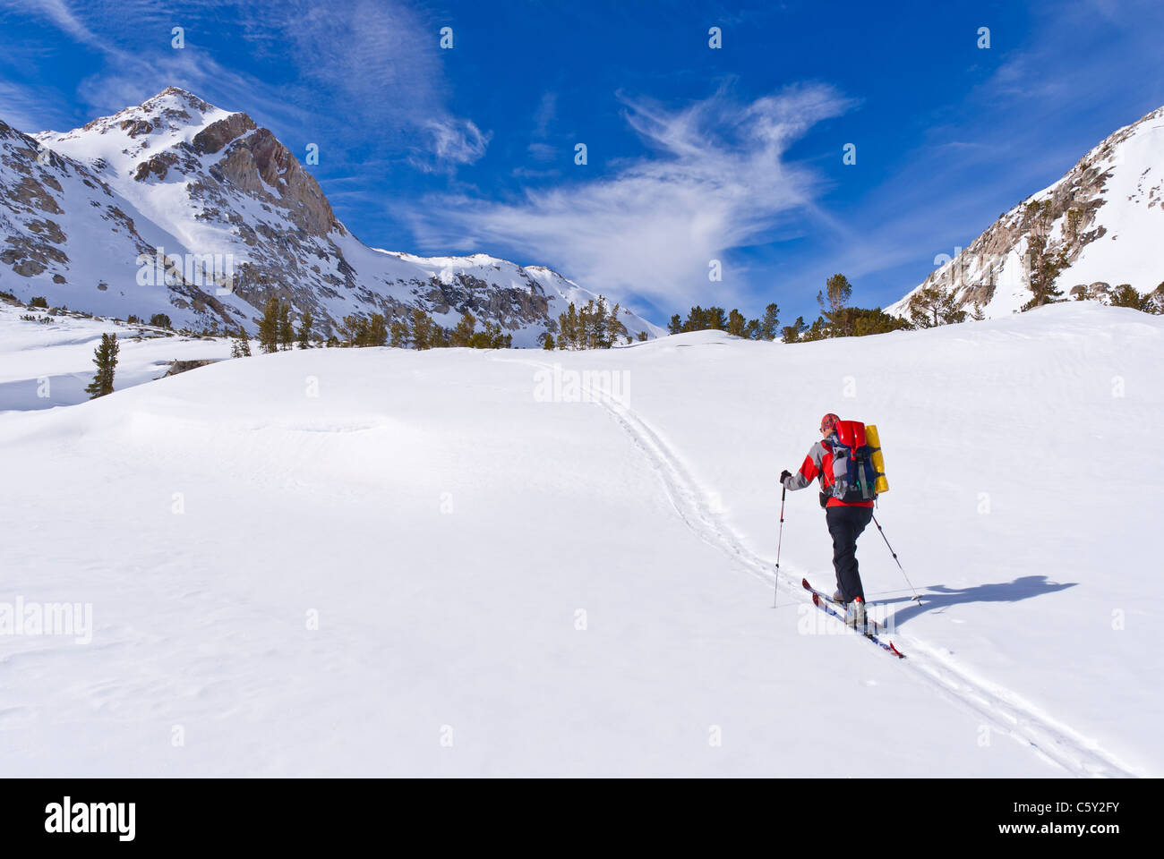 Piute Pass Backcountry skier under Piute Pass, Inyo National Forest, Sierra Nevada ...